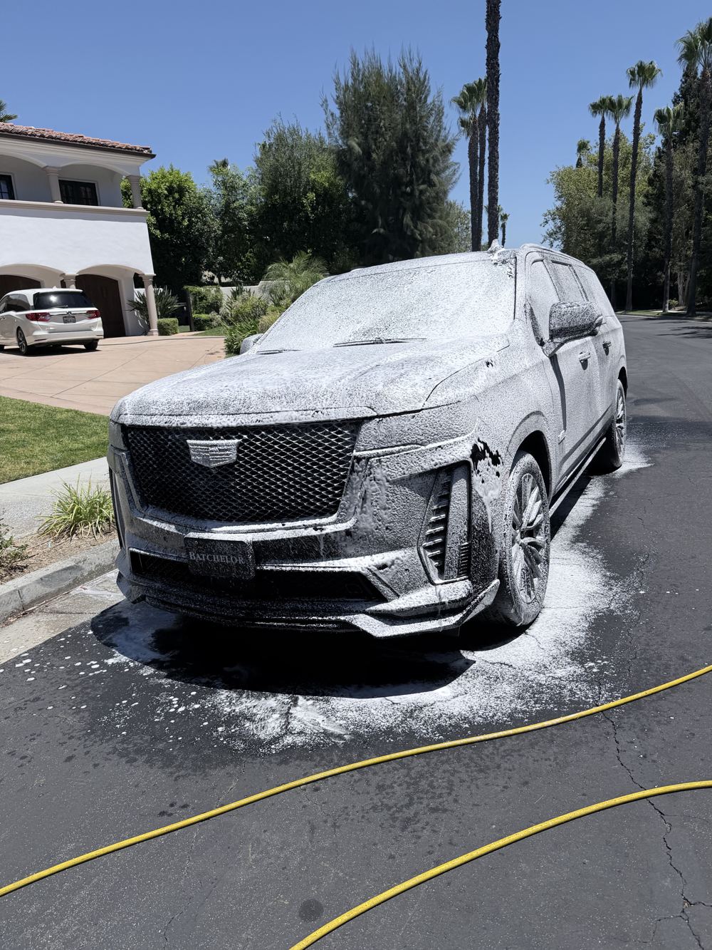 Full-size SUV during the foam pre-wash