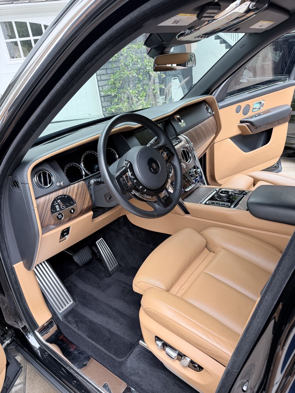 Clean tan leather front interior after detailing
